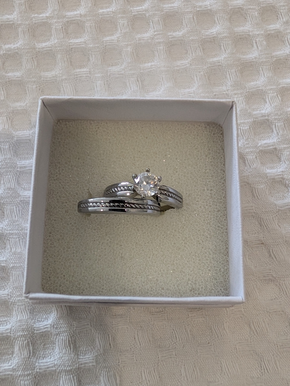 Brilliant Solitaire Engagement Ring Set in Silver Tone